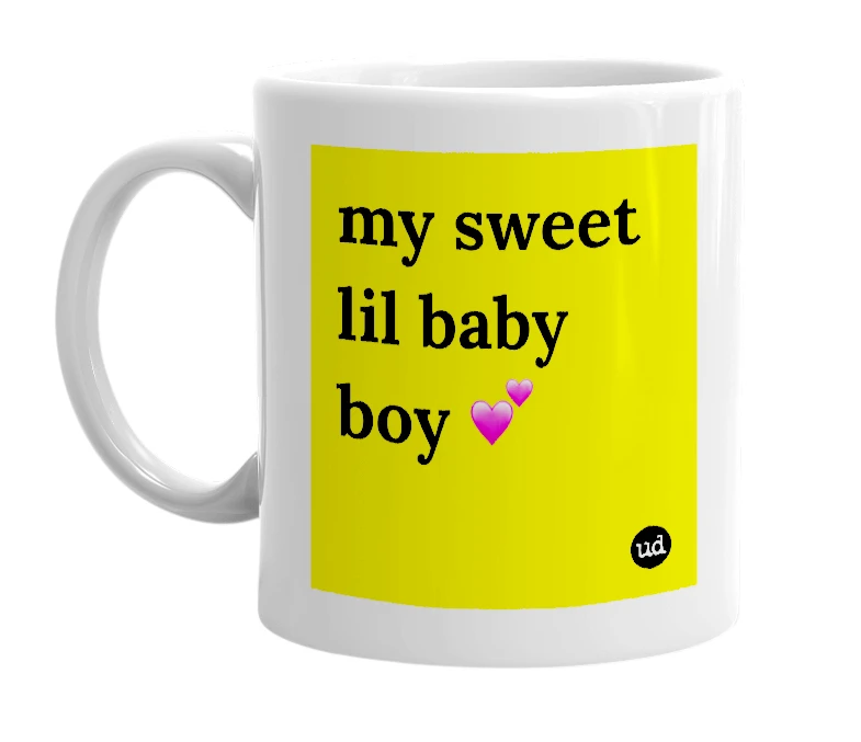 White mug with 'my sweet lil baby boy 💕' in bold black letters