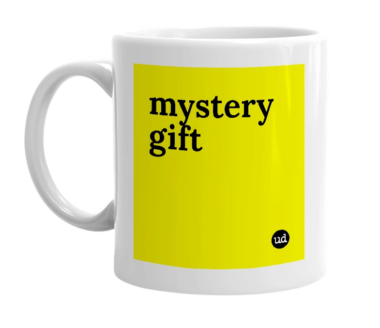 White mug with 'mystery gift' in bold black letters
