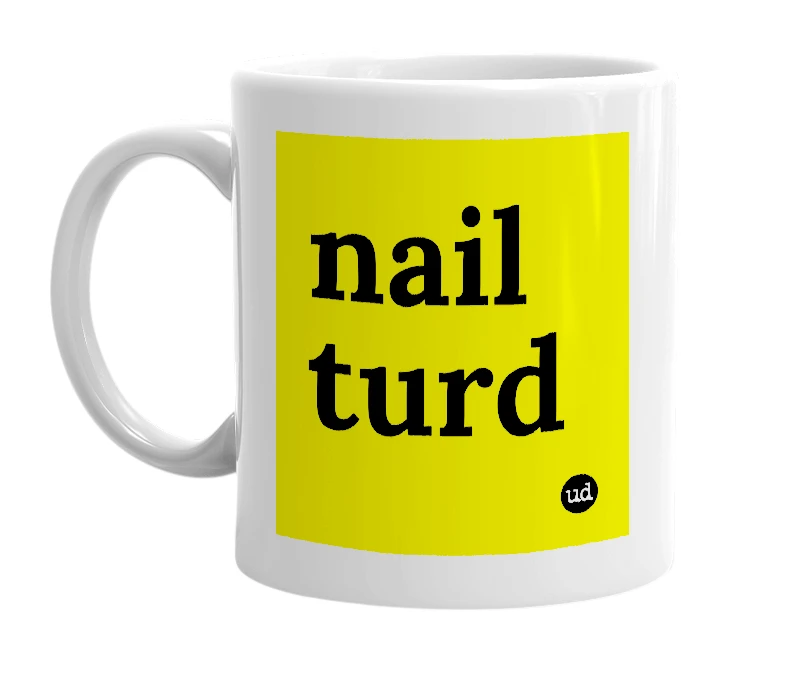 White mug with 'nail turd' in bold black letters