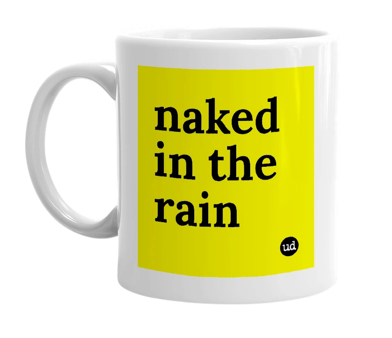 White mug with 'naked in the rain' in bold black letters