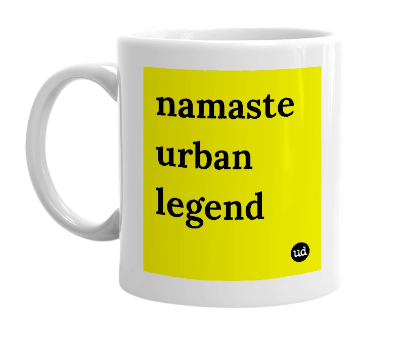 White mug with 'namaste urban legend' in bold black letters