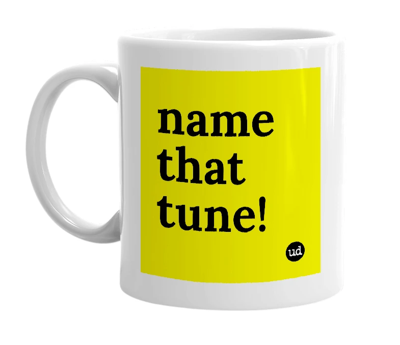 White mug with 'name that tune!' in bold black letters
