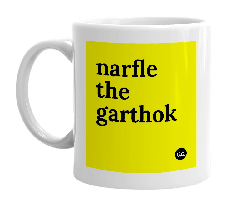 White mug with 'narfle the garthok' in bold black letters