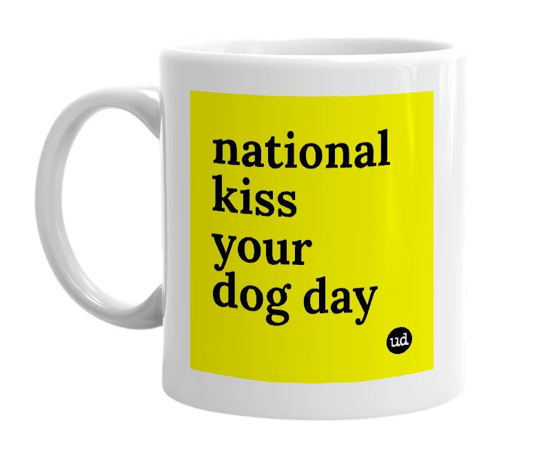 White mug with 'national kiss your dog day' in bold black letters