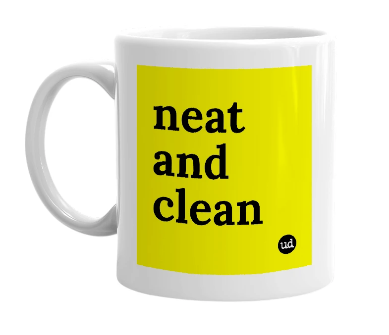 White mug with 'neat and clean' in bold black letters