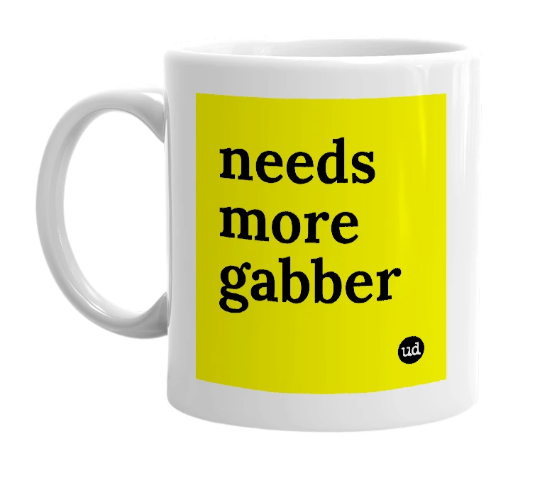 White mug with 'needs more gabber' in bold black letters