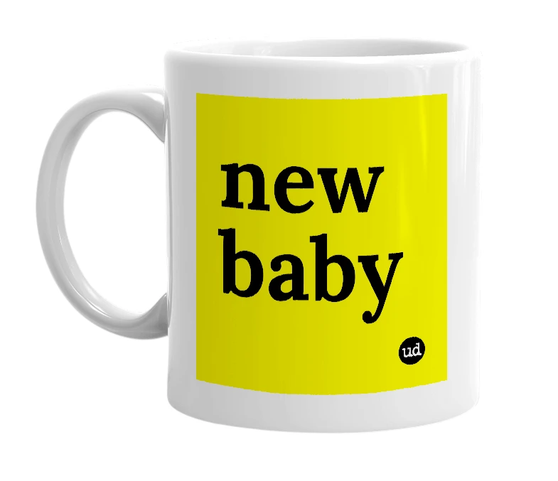 White mug with 'new baby' in bold black letters