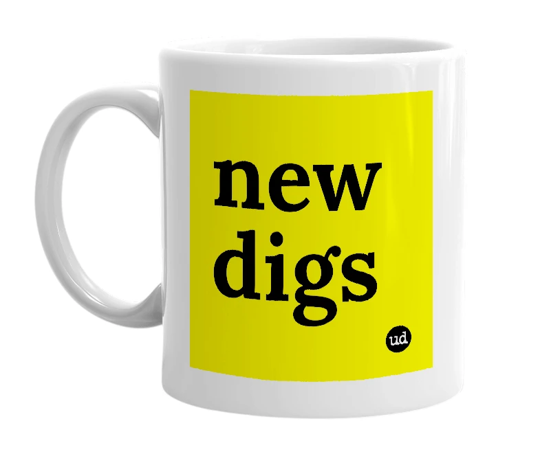 White mug with 'new digs' in bold black letters