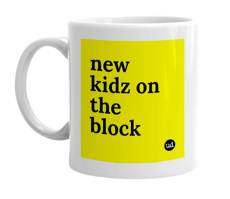 White mug with 'new kidz on the block' in bold black letters