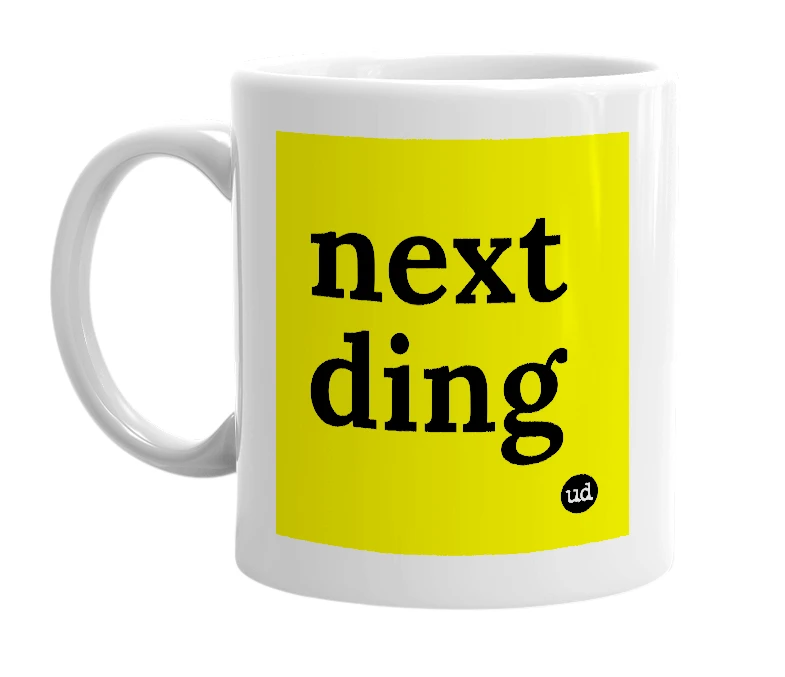 White mug with 'next ding' in bold black letters