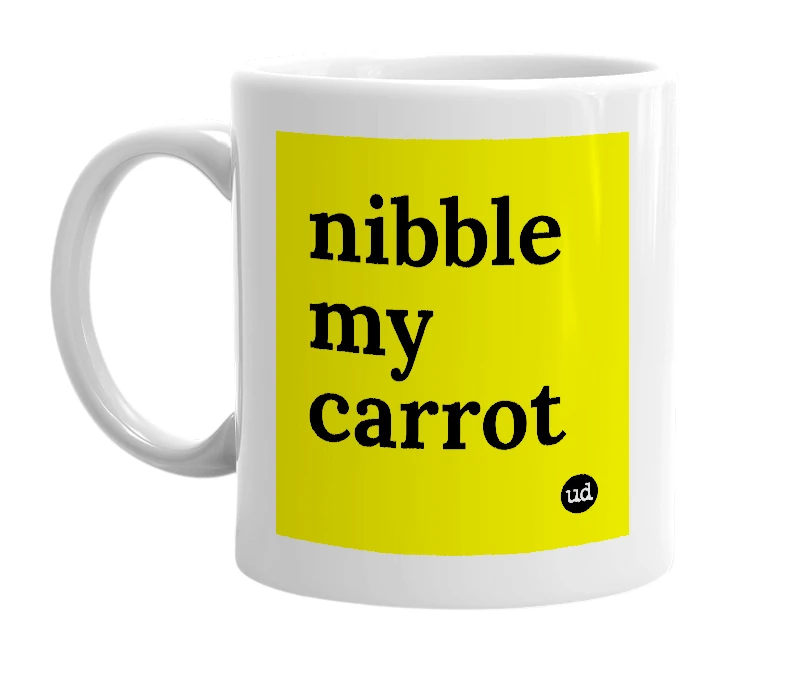 White mug with 'nibble my carrot' in bold black letters