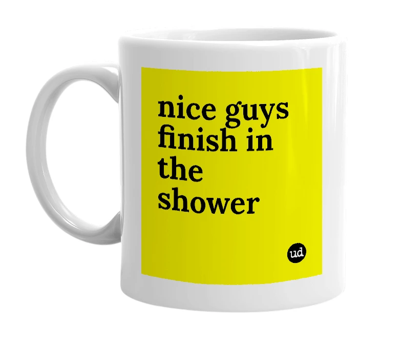 White mug with 'nice guys finish in the shower' in bold black letters