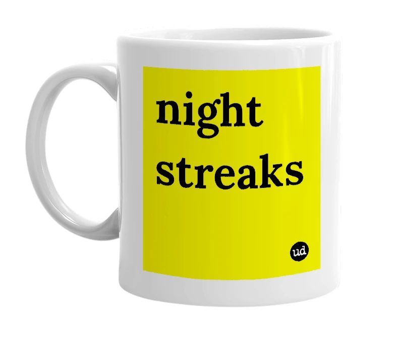 White mug with 'night streaks' in bold black letters