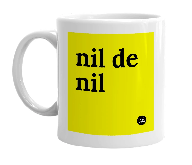 White mug with 'nil de nil' in bold black letters