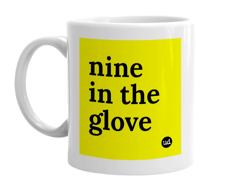 White mug with 'nine in the glove' in bold black letters