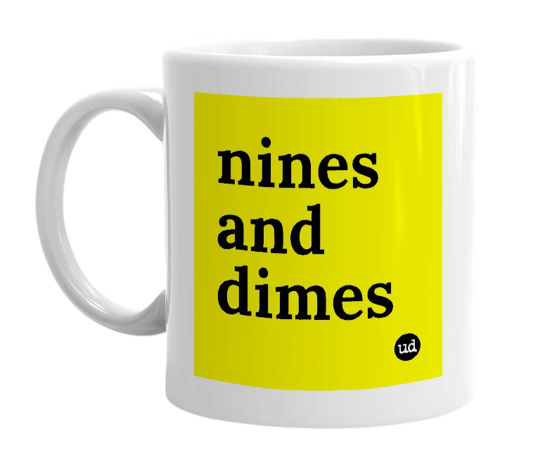 White mug with 'nines and dimes' in bold black letters