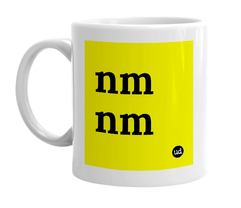 White mug with 'nm nm' in bold black letters