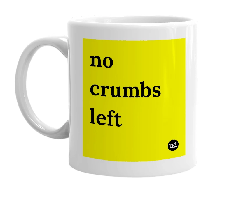 White mug with 'no crumbs left' in bold black letters