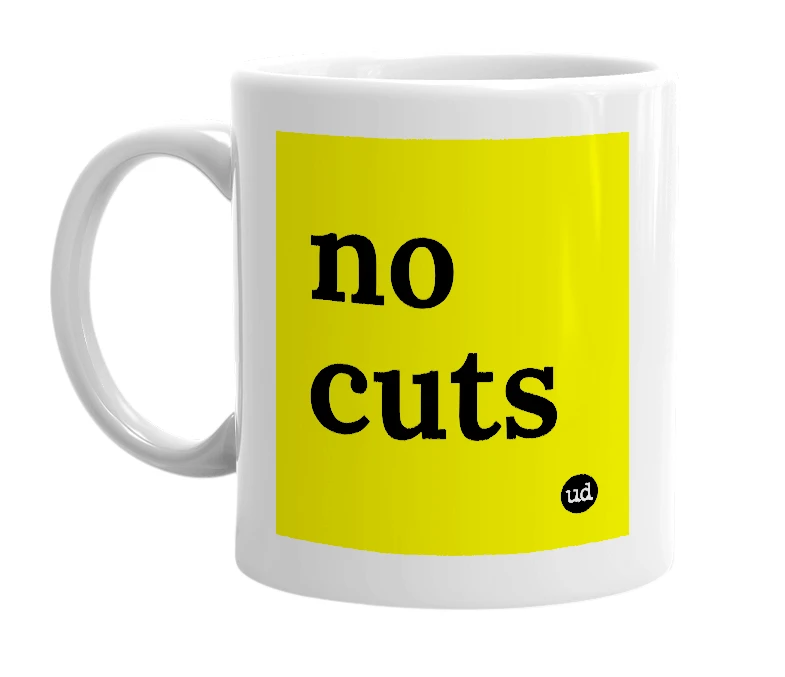 White mug with 'no cuts' in bold black letters