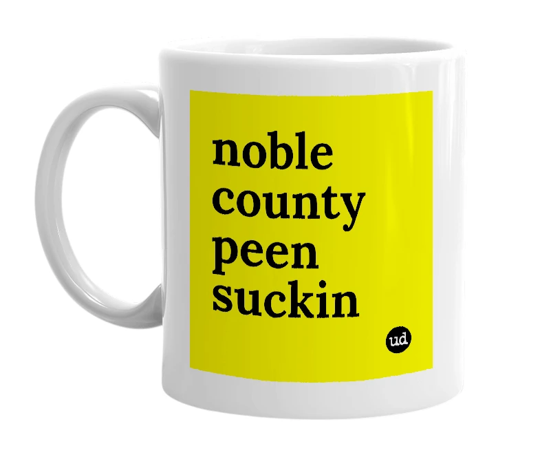 White mug with 'noble county peen suckin' in bold black letters