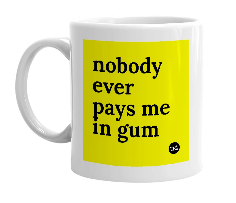 White mug with 'nobody ever pays me in gum' in bold black letters