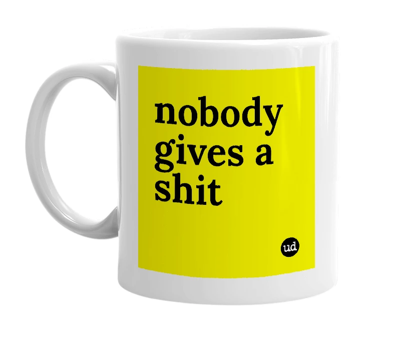 White mug with 'nobody gives a shit' in bold black letters