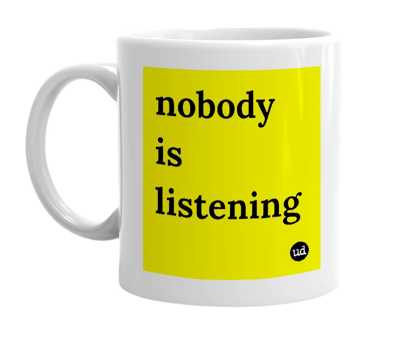 White mug with 'nobody is listening' in bold black letters