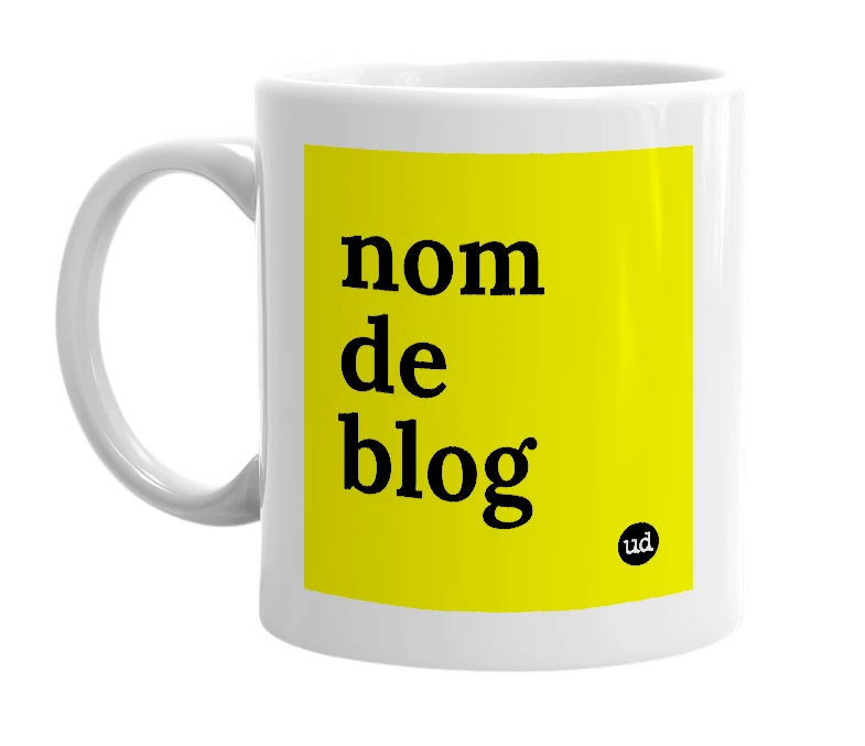 White mug with 'nom de blog' in bold black letters