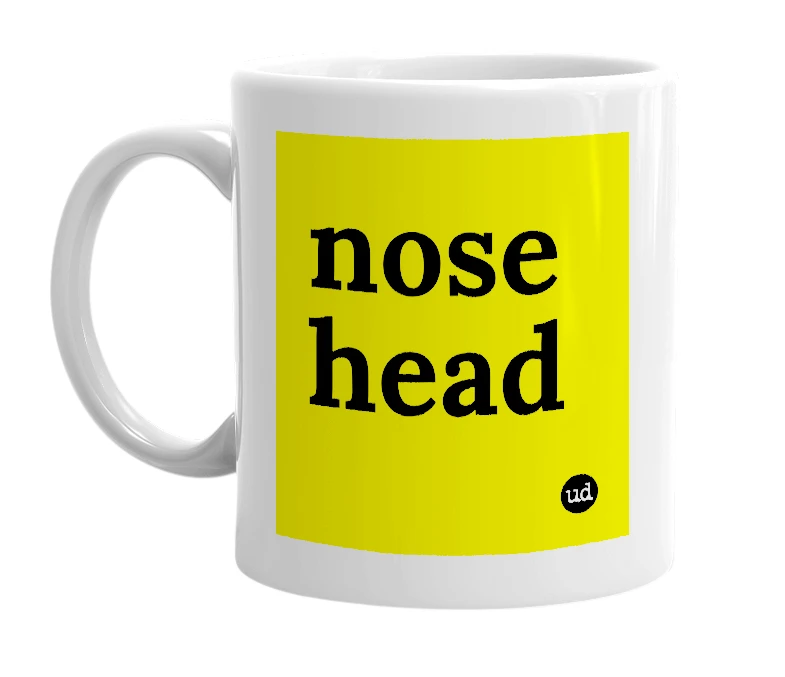 White mug with 'nose head' in bold black letters