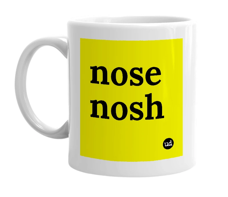 White mug with 'nose nosh' in bold black letters