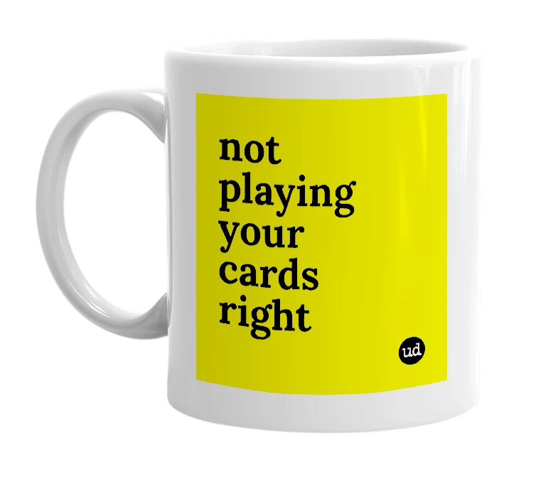 White mug with 'not playing your cards right' in bold black letters