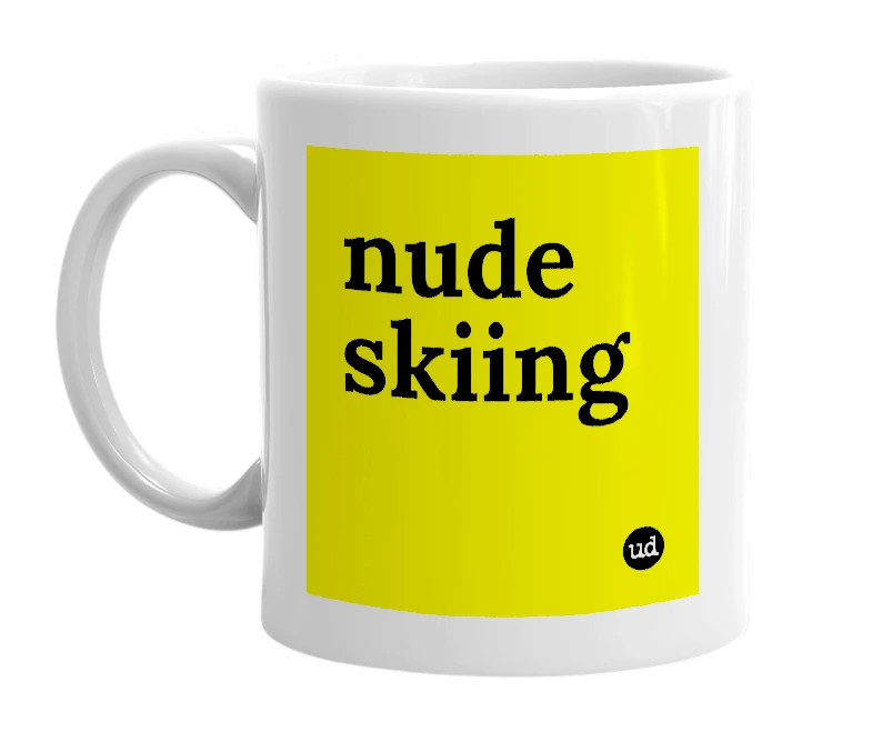 White mug with 'nude skiing' in bold black letters