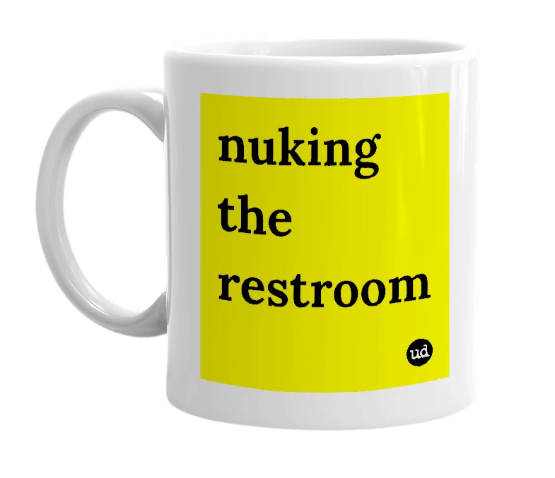 White mug with 'nuking the restroom' in bold black letters