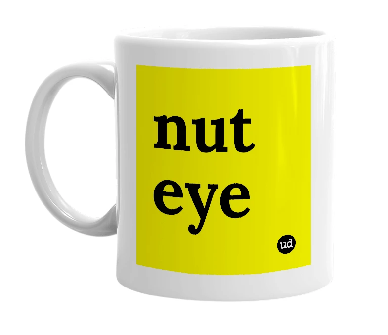 White mug with 'nut eye' in bold black letters
