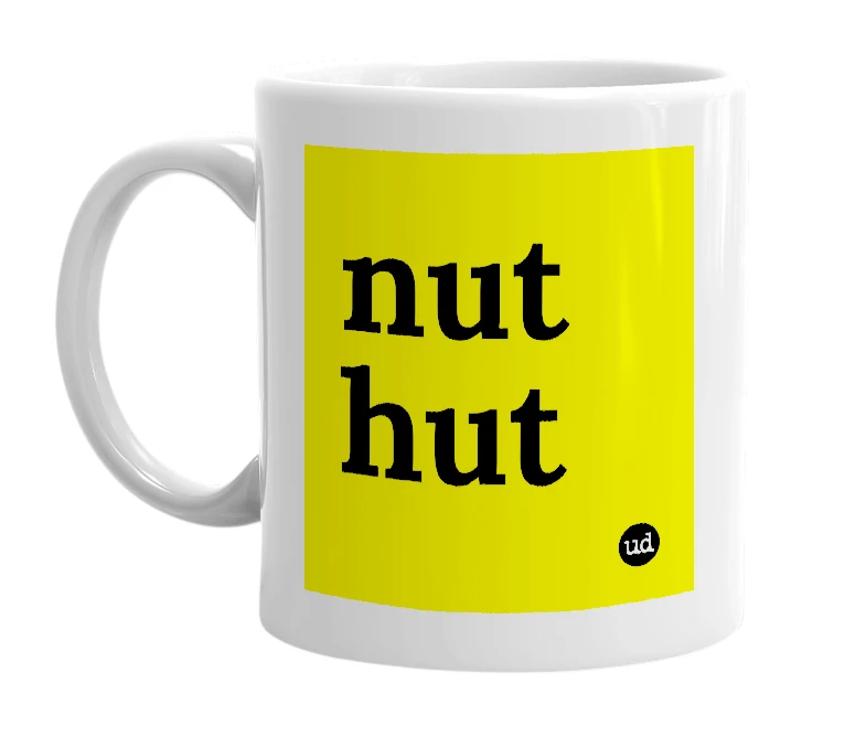 White mug with 'nut hut' in bold black letters
