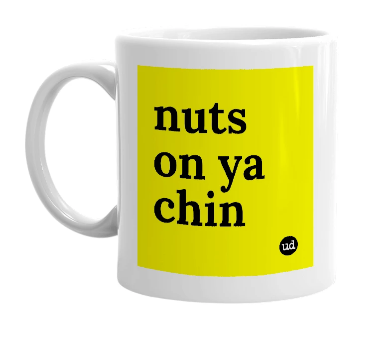 White mug with 'nuts on ya chin' in bold black letters