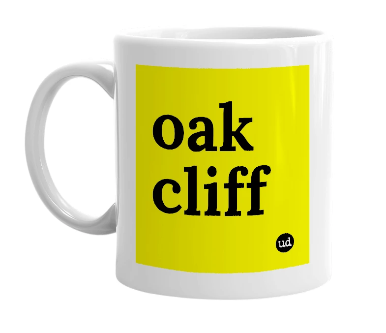 White mug with 'oak cliff' in bold black letters