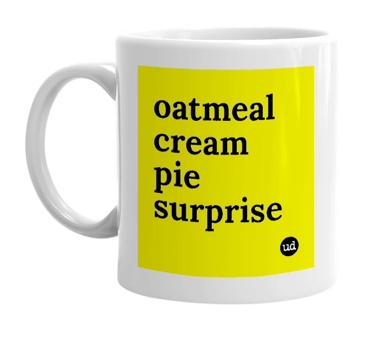 White mug with 'oatmeal cream pie surprise' in bold black letters