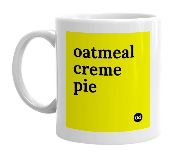 White mug with 'oatmeal creme pie' in bold black letters
