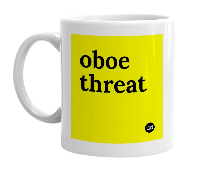 White mug with 'oboe threat' in bold black letters