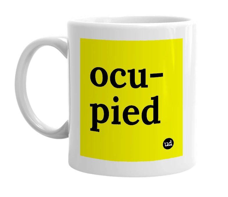 White mug with 'ocu-pied' in bold black letters