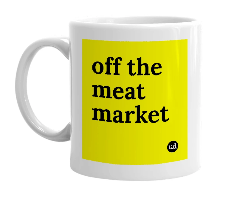 White mug with 'off the meat market' in bold black letters
