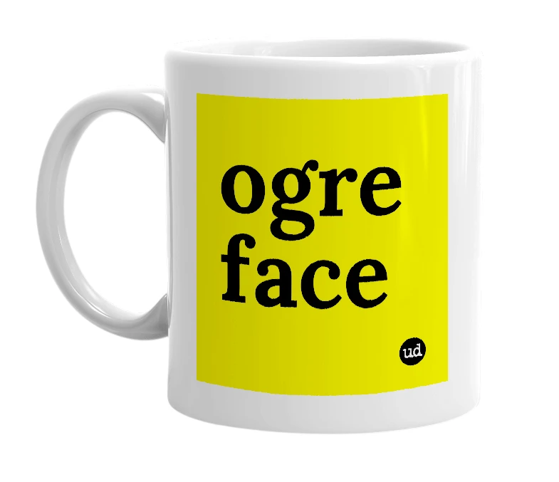 White mug with 'ogre face' in bold black letters