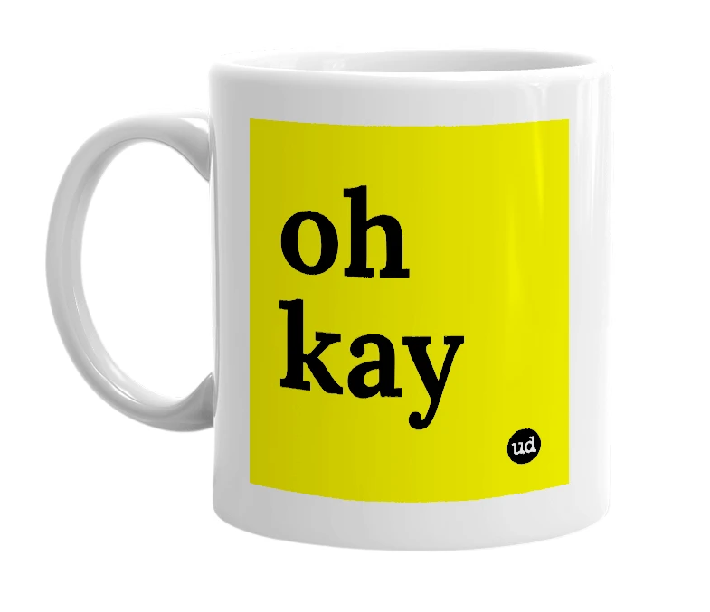 White mug with 'oh kay' in bold black letters