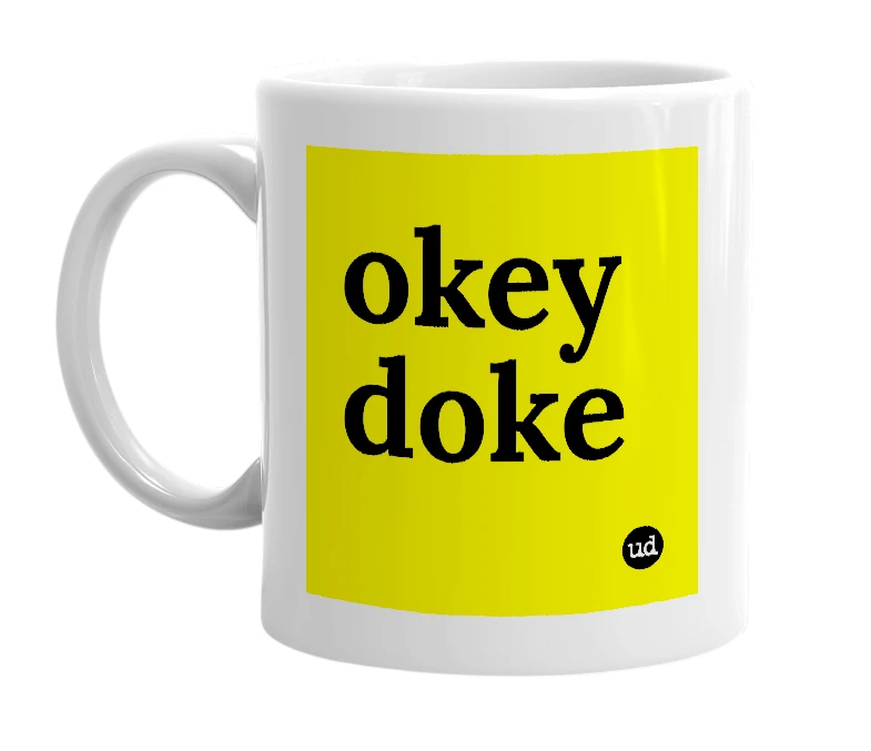White mug with 'okey doke' in bold black letters