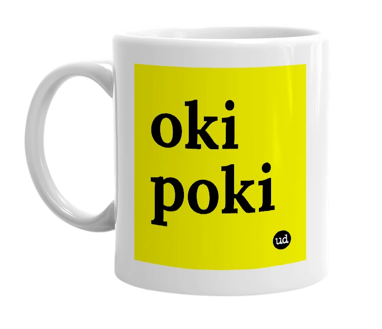 White mug with 'oki poki' in bold black letters