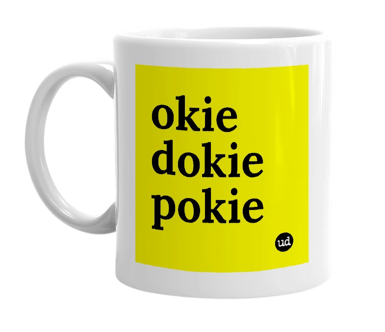 White mug with 'okie dokie pokie' in bold black letters