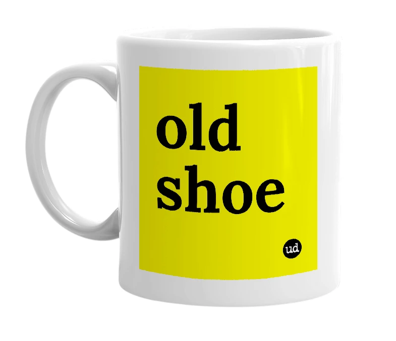 White mug with 'old shoe' in bold black letters