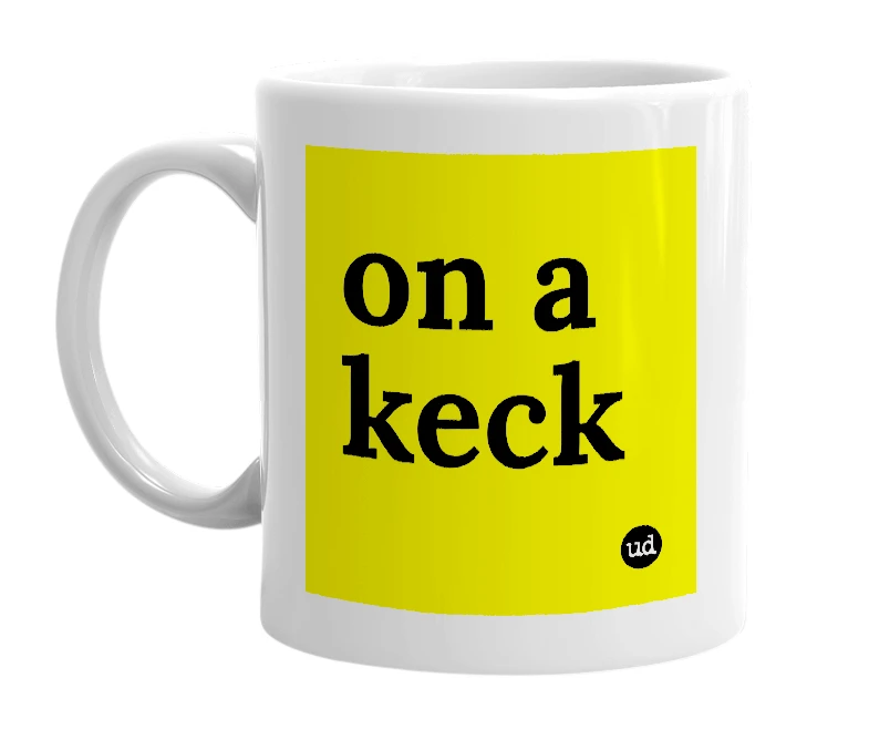 White mug with 'on a keck' in bold black letters