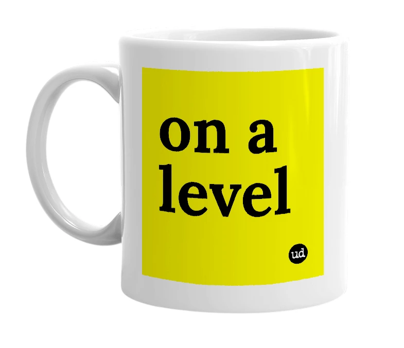 White mug with 'on a level' in bold black letters